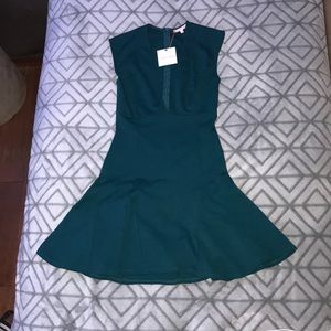 Dark green dress with a low v neck